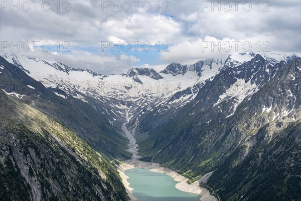 Mountain landscape, view of turquoise-blue lake Schlegeisspeicher, glaciated rocky mountain peaks