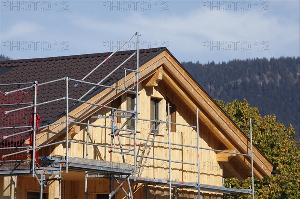 Scaffolded wooden house, renovation, construction site, Garmisch-Partenkirchen, Upper Bavaria,