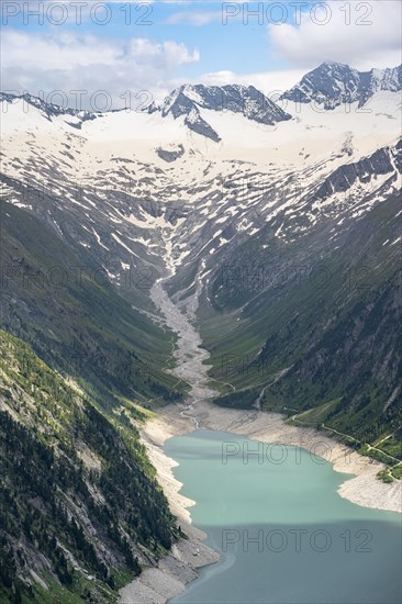 Mountain landscape, view of turquoise-blue lake Schlegeisspeicher, glaciated rocky mountain peaks