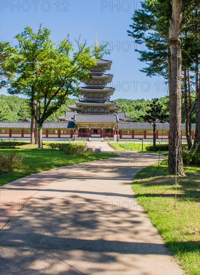 Buyeo, South Korea, July 7, 2018: Sidewalk leading to main gate of Neungsa Baekje Temple with five
