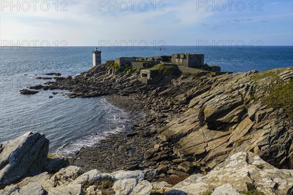 Peninsula Kermorvan with lighthouse and fort, behind the island Ouessant, Le Conquet, department
