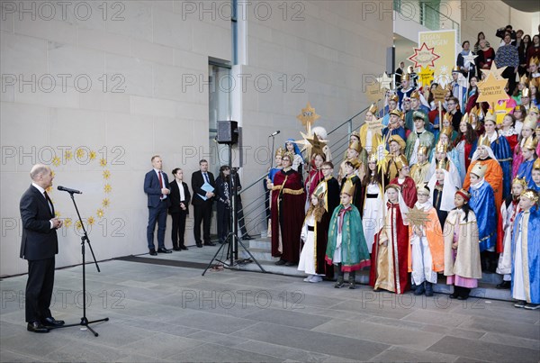 Federal Chancellor Olaf Scholz (SPD) pictured at the traditional reception for carol singers at the