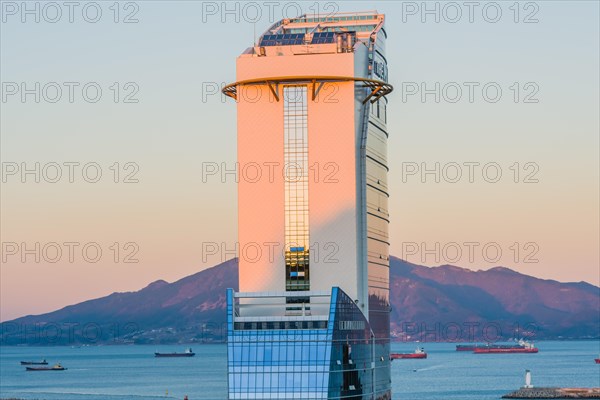 Yeoso, South Korea: December 25, 2017: Top of the MVL hotel with mountains and the harbor full of