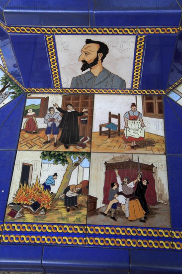 Ceramic tiles on street furniture seat scenes from Cervantes Don Quixote story, Algeciras, Spain,