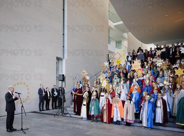 Federal Chancellor Olaf Scholz (SPD) pictured at the traditional reception for carol singers at the