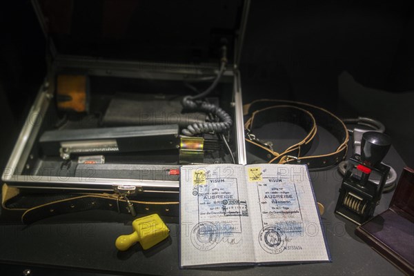 Passport with visas for West-Berlin and FRG and ID check kit including UV control apparatus used by