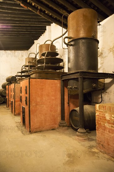 Old distilling equipment for brandy cognac production in Gonzalez Byass bodega, Jerez de la