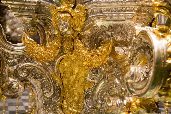 Close up of elaborately metalwork in gold inside the Catholic cathedral, former great mosque,