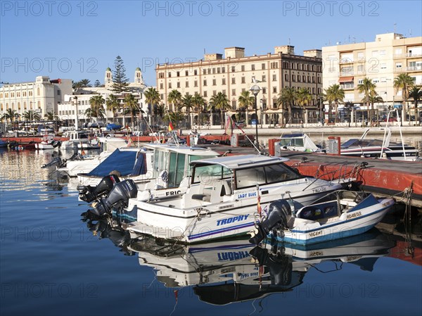 Boats in harbour and town centre buildings, Melilla. Spanish territory in north Africa, Spain,