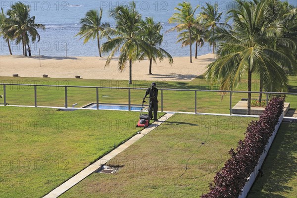 Amaya Beach Resort and Spa hotel, Pasikudah Bay, Eastern Province, Sri Lanka, Asia staff tending