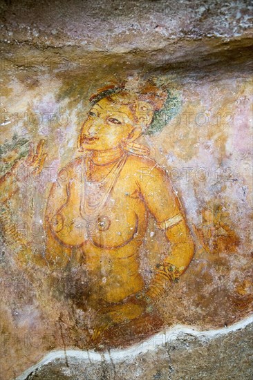 Rock painting frescoes of maidens in the palace fortress, Sigiriya, Central Province, Sri Lanka,