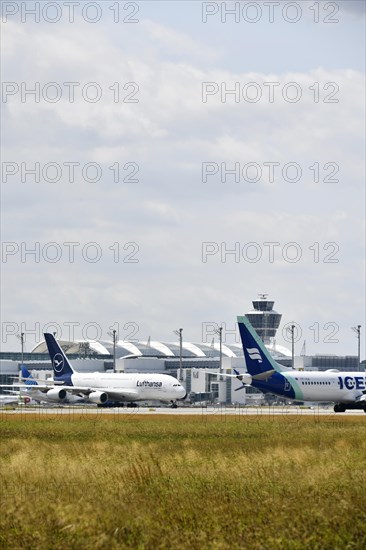 Lufthansa Airbus A380-800 with Iceland Air in front of Terminal 2, Munich Airport, Upper Bavaria,