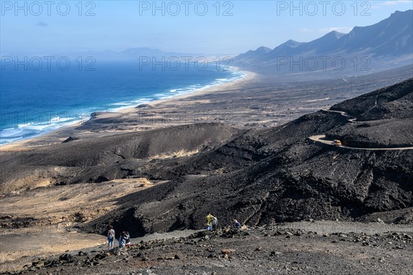 View from viewpoint Mirador di Cofete on surf in front of beach of East Atlantic Atlantic landscape