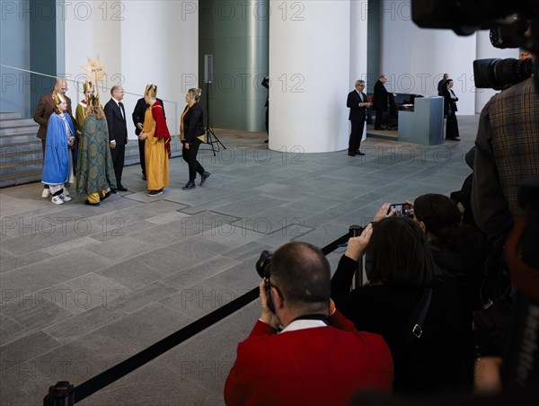 Federal Chancellor Olaf Scholz (SPD) pictured at the traditional reception for carol singers at the