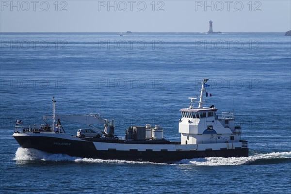 Transport ship Le Molenez for supplying the islands of Ouessant, Molene and Sein, here passing the