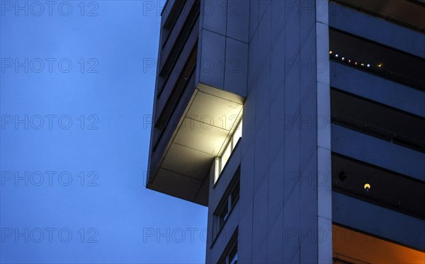 Illuminated flat in a tower block in Gropiusstadt. The rise in rents in German cities has increased