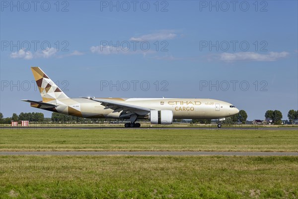 Etihad Cargo Boeing 777-FFX with registration A6-DDD lands on the Polderbaan, Amsterdam Schiphol