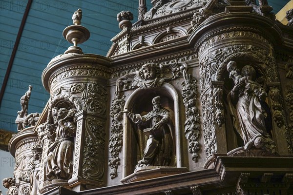 Renaissance-style carved canopy of the baptismal font, Enclos Paroissial enclosed parish of