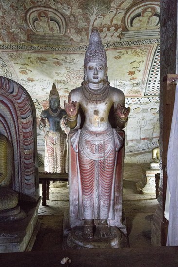Buddha figures inside Dambulla cave Buddhist temple complex, Sri Lanka, Asia