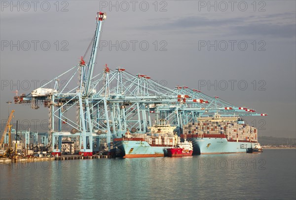 Large cranes at APM Terminals loading container ships port at Algeciras, Cadiz Province, Spain,