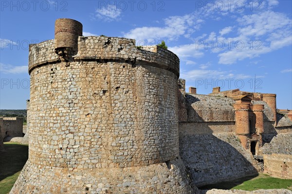 Moat and ramparts of the Catalan fortress Fort de Salses at Salses-le-Chateau, Pyrenees, France,