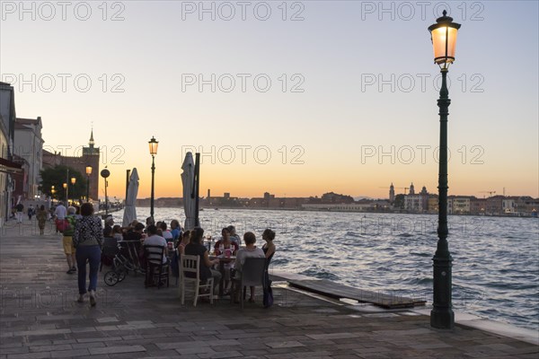 Restaurant on the waterfront of the Guidecca Canal, Dorsoduro district, Venice, Veneto, Italy,