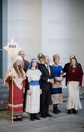 Federal Chancellor Olaf Scholz (SPD) pictured at the traditional reception for carol singers at the
