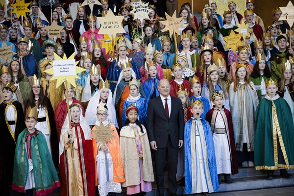 Federal Chancellor Olaf Scholz (SPD) pictured at the traditional reception for carol singers at the