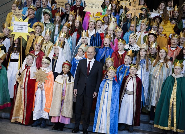 Federal Chancellor Olaf Scholz (SPD) pictured at the traditional reception for carol singers at the