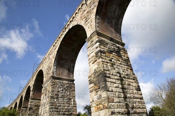 Stone arches of railway viaduct crossing River Tweed, Berwick-upon-Tweed, Northumberland, England,