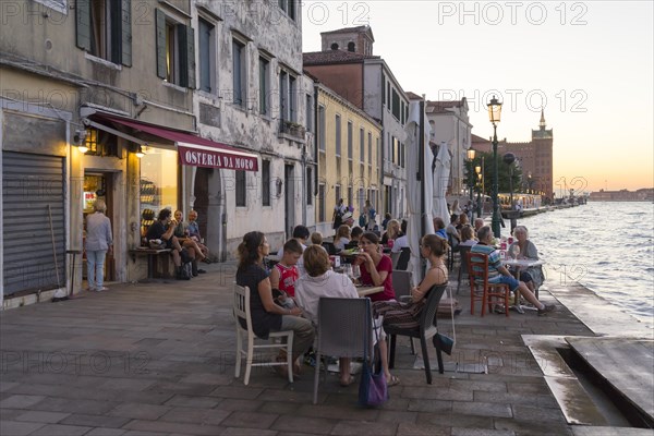 Restaurant on the waterfront of the Guidecca Canal, Dorsoduro district, Venice, Veneto, Italy,
