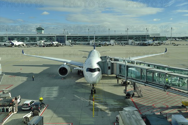 Airbus A 350 900 Singapore Airline at the gate of Terminal 2 Munich Airport Franz Josef Strauss,