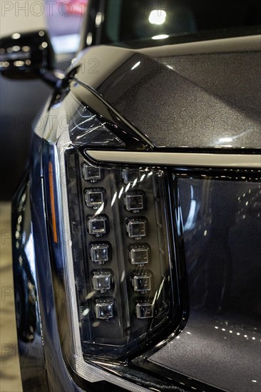 Pontiac, Michigan USA, 4 January 2024, A headlight of the Kia EV9, which won the North American