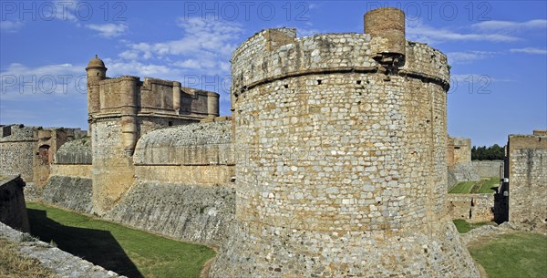 Moat and ramparts of the Catalan fortress Fort de Salses at Salses-le-Chateau, Pyrenees, France,