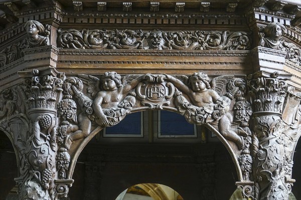 Renaissance-style carved canopy of the baptismal font, Enclos Paroissial enclosed parish of