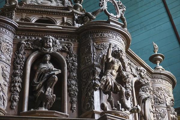 Renaissance-style carved canopy of the baptismal font, Enclos Paroissial enclosed parish of