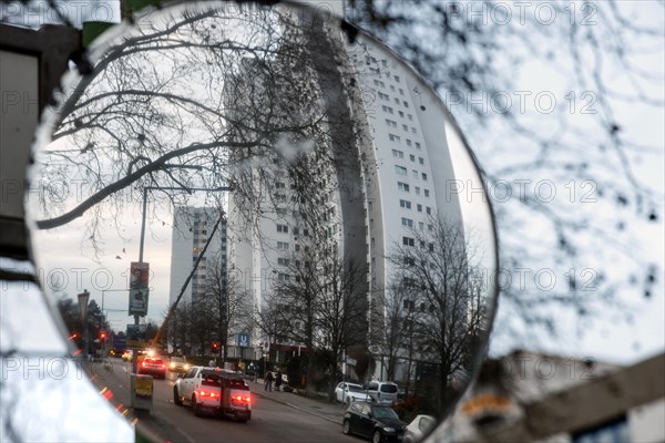 Reflection of high-rise buildings in Gropiusstadt. The rise in rents in German cities has increased