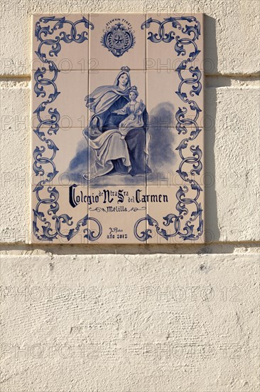 Close up of ceramic tiles sign for Lasalle de Carmen college, Melilla autonomous city state Spanish
