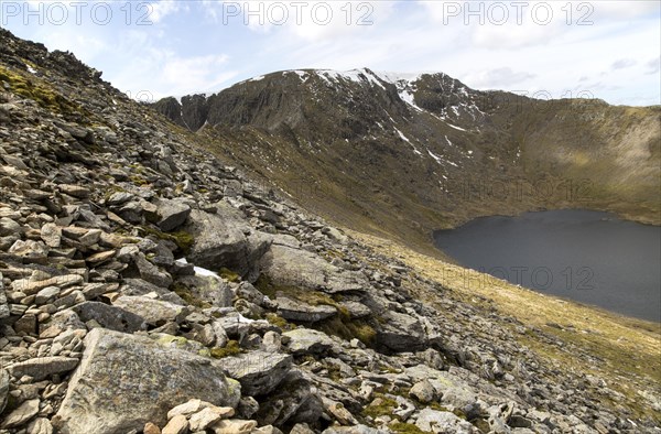 Striding Edge arete Helvellyn mountain peak and Red Tarn corrie lake, Lake District, Cumbria,