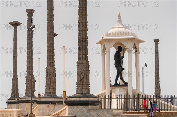 Child at the foot of a Mahatma Gandhi monument, statue, former French colony of Pondicherry or