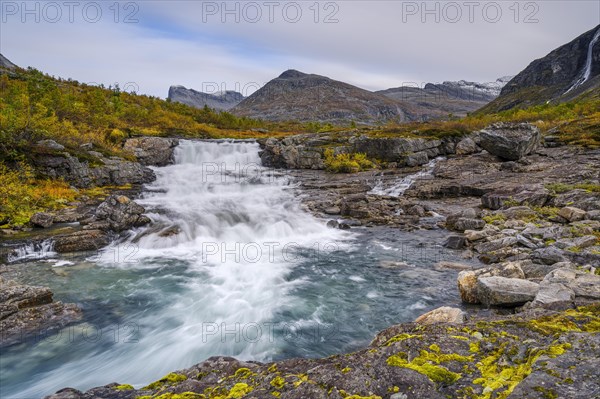 Autumn in Reinheimen National Park, mountains with river in Valldalen valley, Stigbotthornet