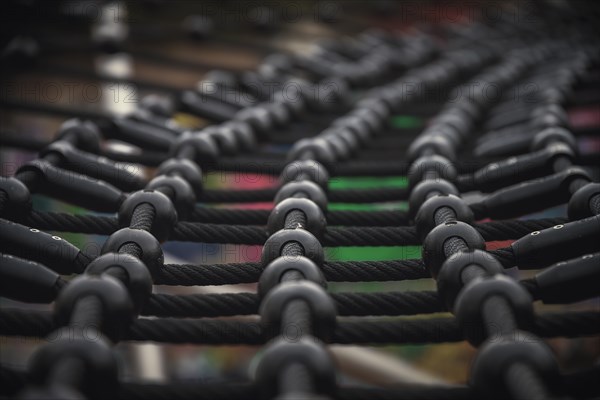 Detailed view of a rope net on a children's playground with bokeh effect, Wuppertal Elberfeld,