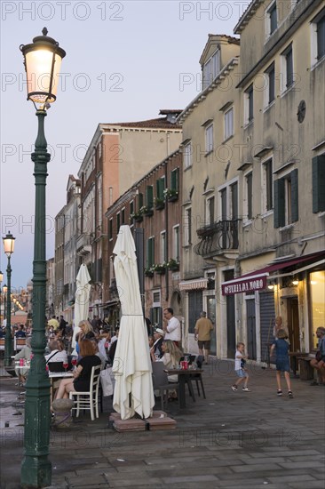 Restaurant on the waterfront of the Guidecca Canal, Dorsoduro district, Venice, Veneto, Italy,
