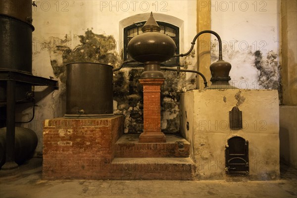 Old distilling equipment for brandy cognac production in Gonzalez Byass bodega, Jerez de la