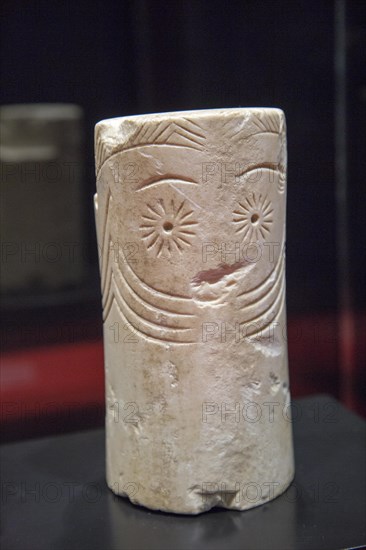 Chalcolithic marble cylinder shaped idol from 2, 500 BC archaeology museum, Jerez de la Frontera,