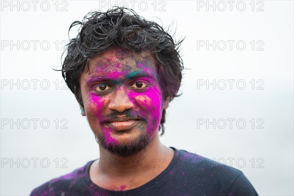 Man with colour on his face, Holi Festival, Indian spring festival, traditional festival of