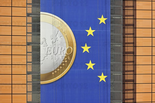 Banner about the euro hanging from the Berlaymont building of the European Commission, executive