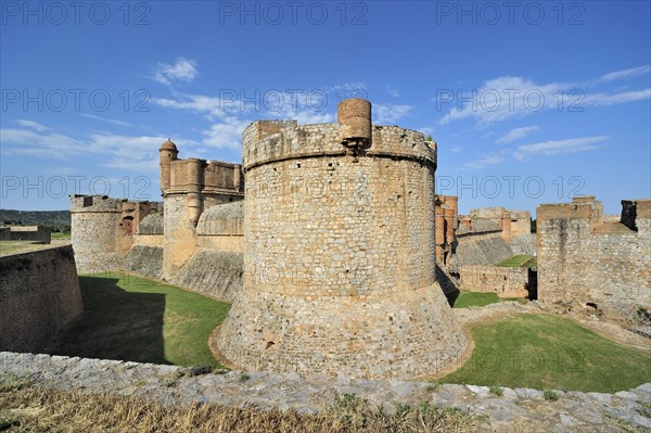 Moat and ramparts of the Catalan fortress Fort de Salses at Salses-le-Chateau, Pyrenees, France,