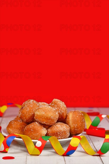 Traditional German 'Berliner Pfannkuchen', a donut without hole filled with jam served during