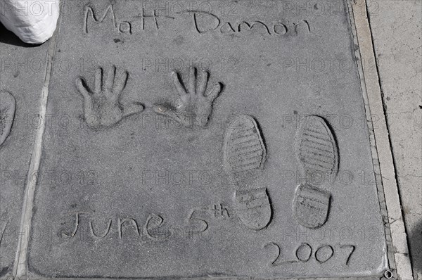 Handprints and footprints of MATT DAMON, Hollywood Boulevard, Los Angeles, California, USA, North